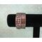 Copper fold formed textured cuff bracelet w/tactile braille "I am enough" in Contracted Braille. Antiqued, burnished, and polished.